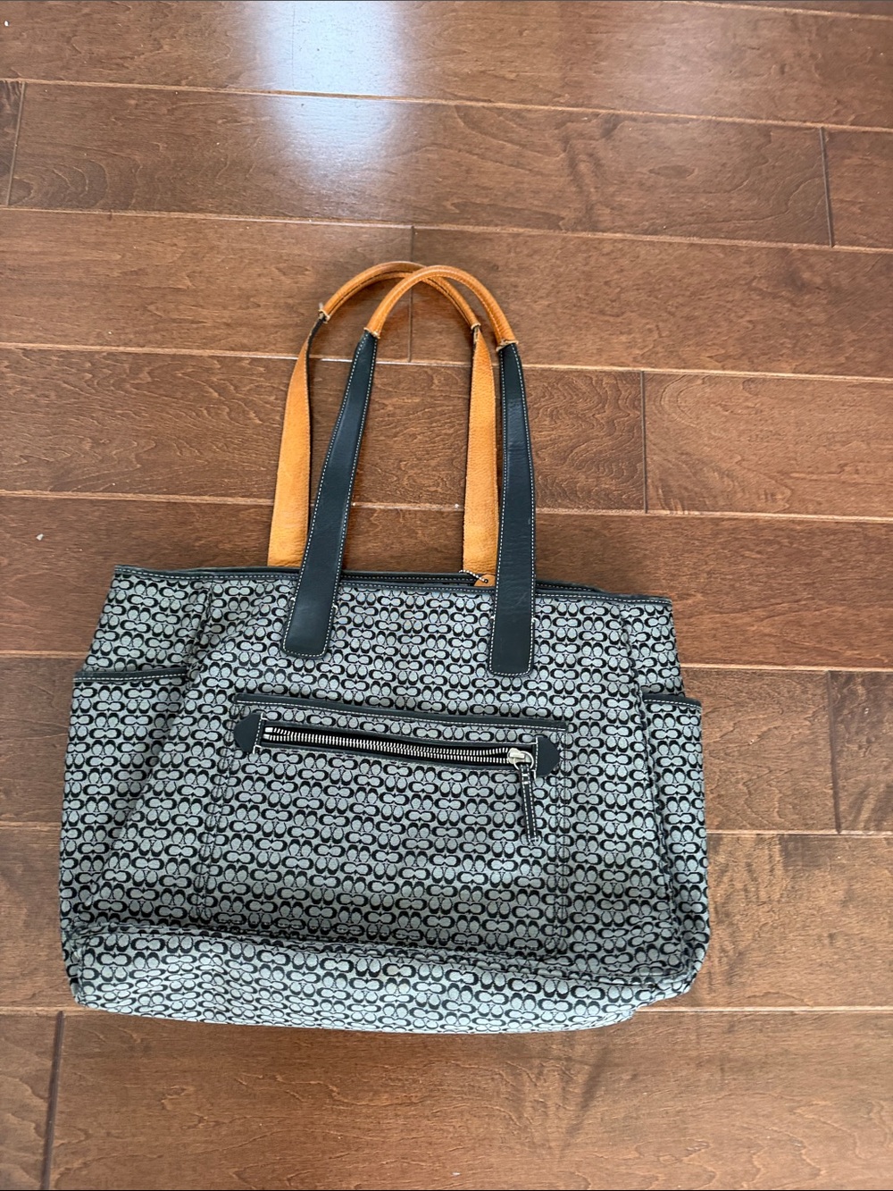 Stylish Black Patterned Tote Bag with Tan Handles coach c laptop bag